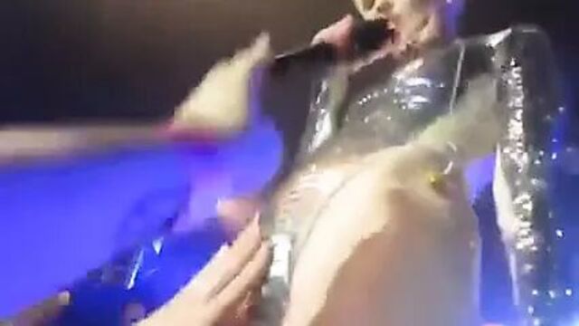 Sluty Miley Cyrus let's Fans touch her pussy