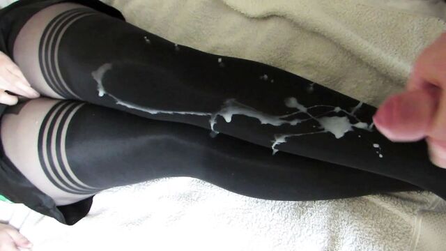 Thick cum on her nylon legs, tights layered over stockings