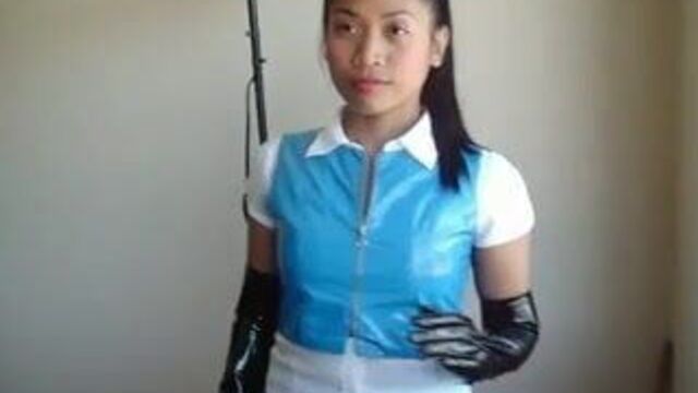 Asian in blue PVC skirt and top