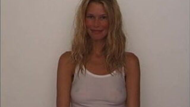 Claudia Schiffer showing nipples in a see-through shirt