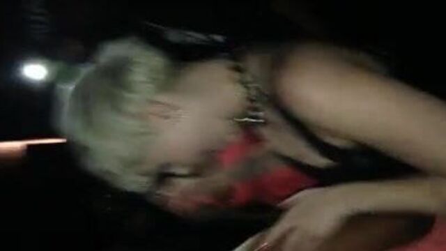 Miley Cyrus dancing in a club
