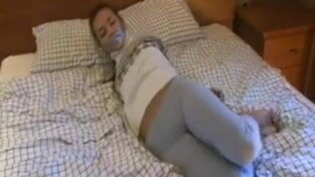 Tied Up In Her Sweater